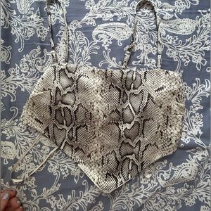 Snake skin styled crop top with accent in the front.